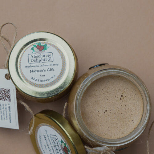 Assortment of jars containing Mushroom Infused Honey